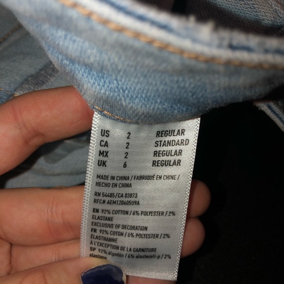 Ripped blue jeans - Picture 3 of 3